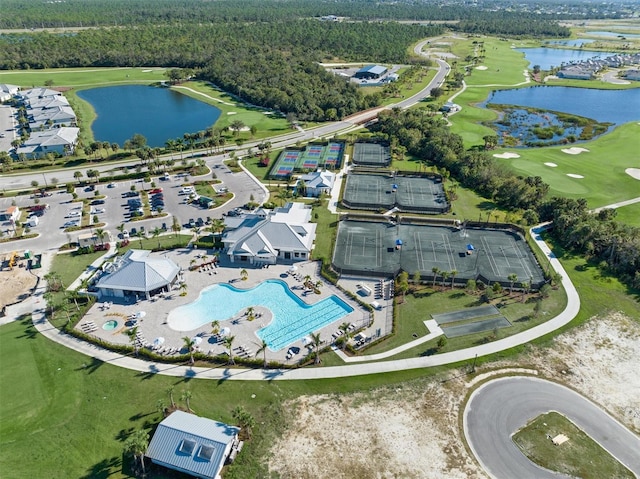 birds eye view of property with a water view