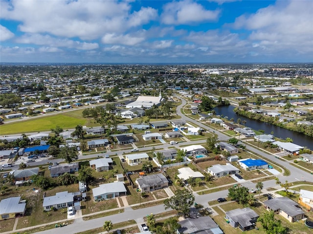 22062 Marshall Ave, Port Charlotte, FL 33952 - aerial view of property's location with nearby suburban area and a nearby body of water