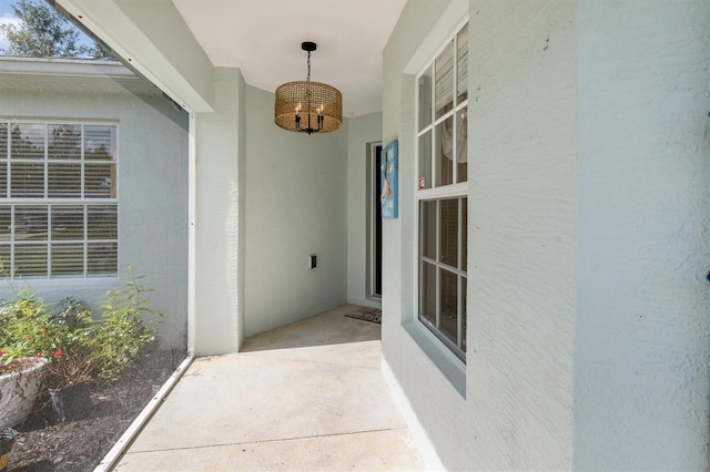 doorway to property with a patio