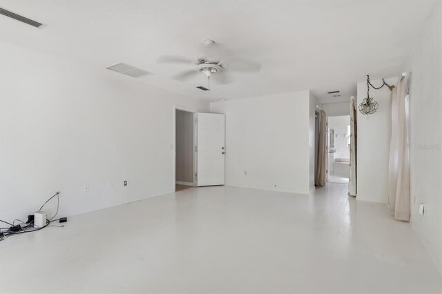 unfurnished room with ceiling fan