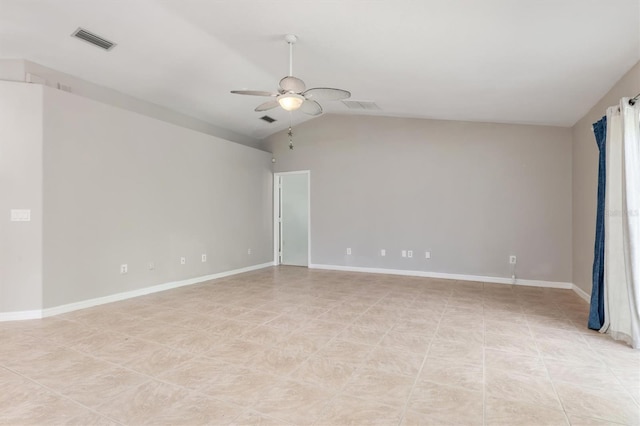 empty room featuring ceiling fan and lofted ceiling