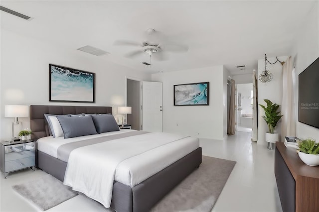 bedroom with ceiling fan and ensuite bathroom