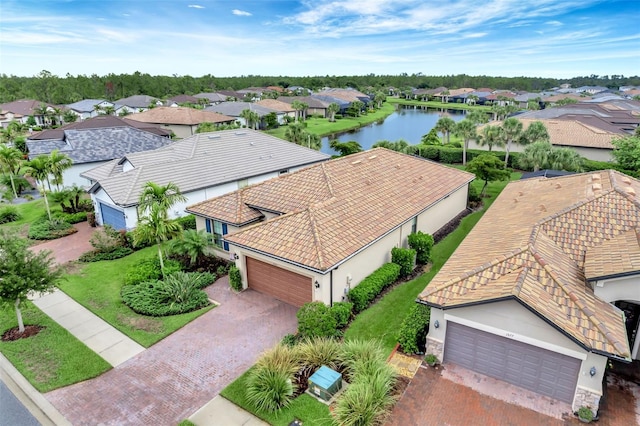 bird's eye view with a water view