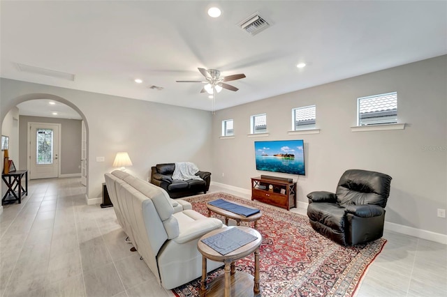 living room with ceiling fan