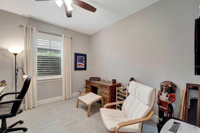 office space featuring ceiling fan and light tile patterned flooring