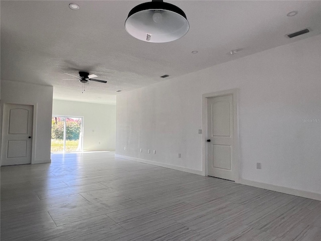 empty room with ceiling fan