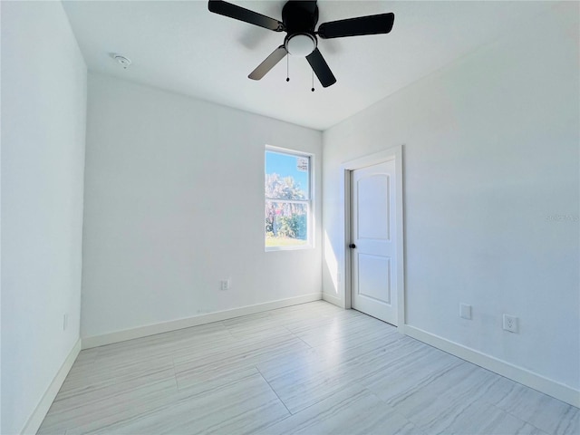 spare room featuring ceiling fan