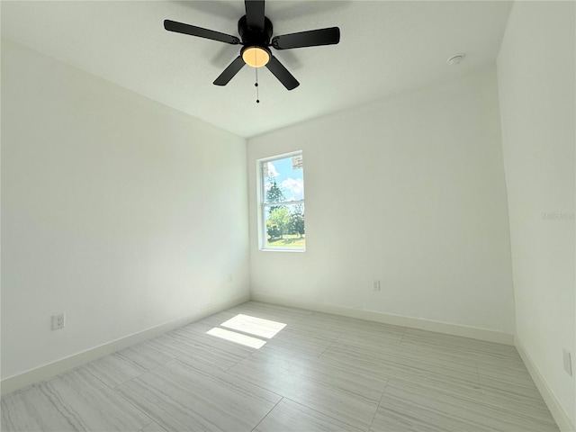 26345 Trinilas Dr, Punta Gorda, FL 33983 - spare room with baseboards and ceiling fan