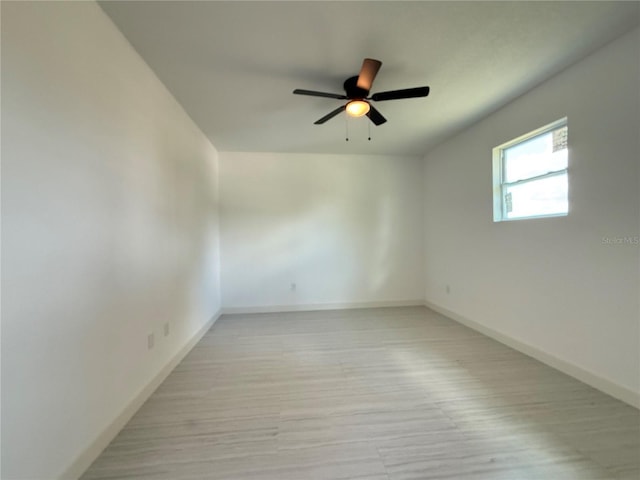 26345 Trinilas Dr, Punta Gorda, FL 33983 - unfurnished room featuring light wood-style flooring, baseboards, and ceiling fan