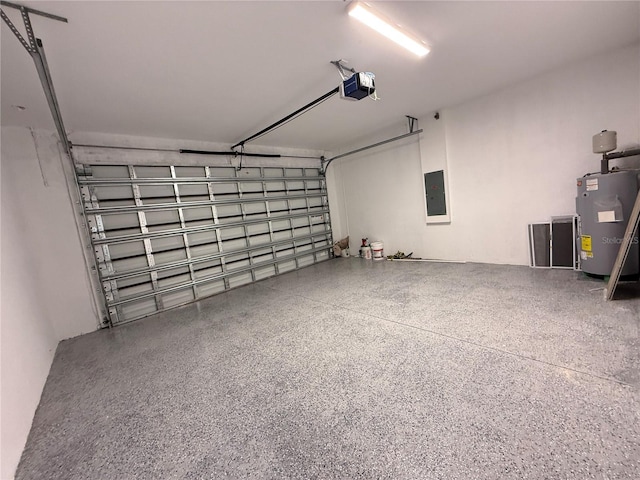 26345 Trinilas Dr, Punta Gorda, FL 33983 - garage with water heater, electric panel, and a garage door opener