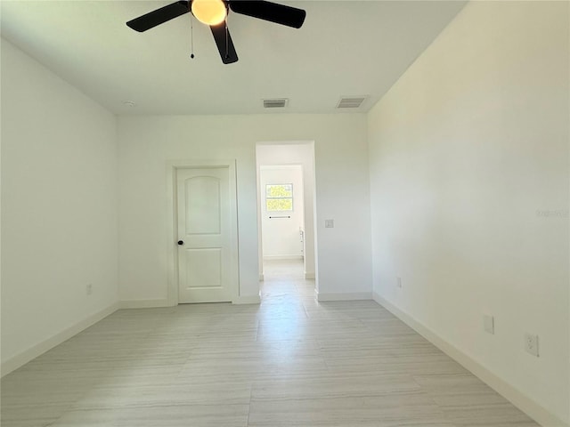 26345 Trinilas Dr, Punta Gorda, FL 33983 - empty room featuring baseboards, ceiling fan, and visible vents
