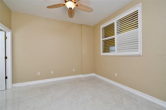 empty room featuring ceiling fan