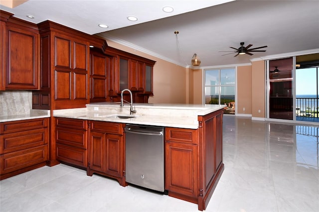 kitchen with sink, ceiling fan, backsplash, ornamental molding, and stainless steel dishwasher