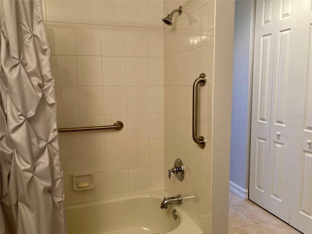 bathroom featuring tile patterned floors and shower / tub combo with curtain