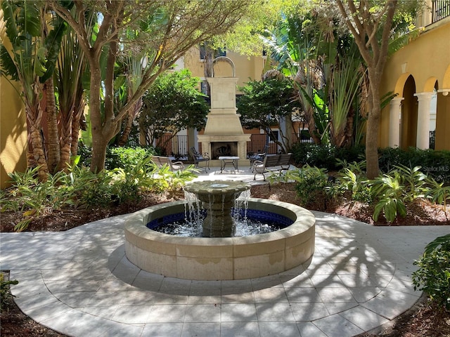 view of property's community featuring a patio