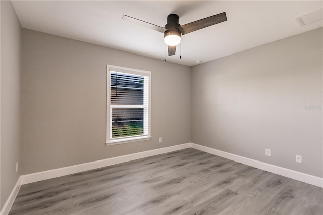 unfurnished room featuring ceiling fan and light hardwood / wood-style floors