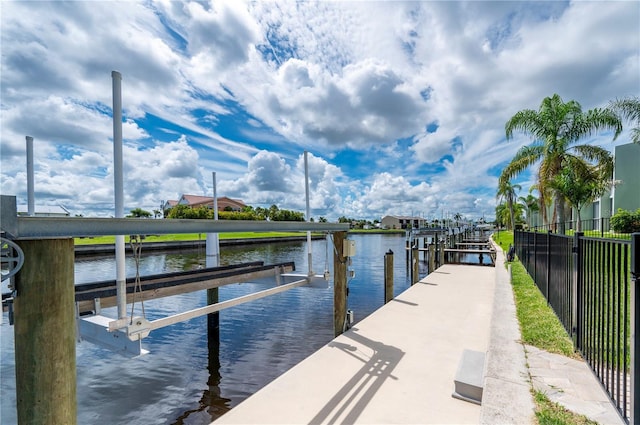 dock area featuring a water view