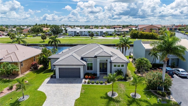 bird's eye view with a water view