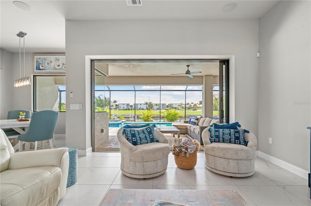 living room with ceiling fan