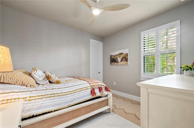 bedroom featuring ceiling fan