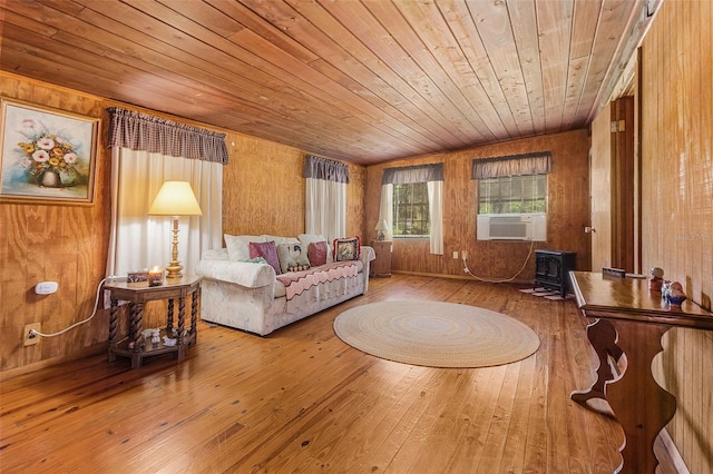 living room featuring wood ceiling, wood walls, and hardwood / wood-style floors