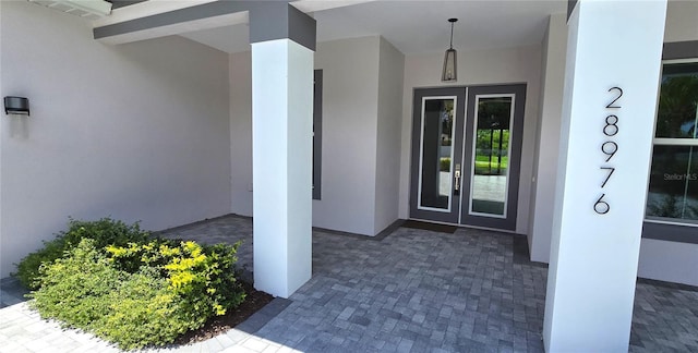 doorway to property featuring french doors