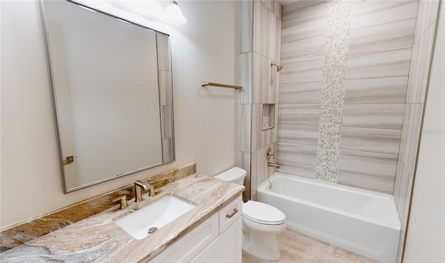 full bathroom featuring shower / bath combination, toilet, and vanity