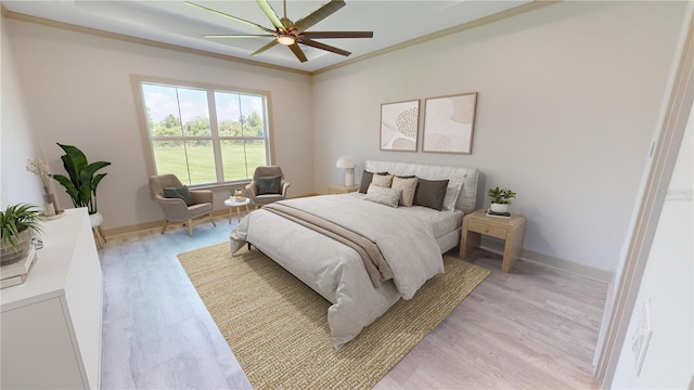 bedroom featuring ceiling fan, light hardwood / wood-style flooring, and crown molding