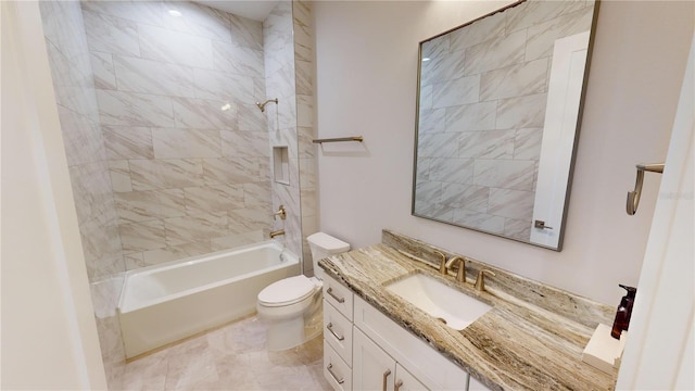 full bathroom with toilet, tiled shower / bath combo, and vanity