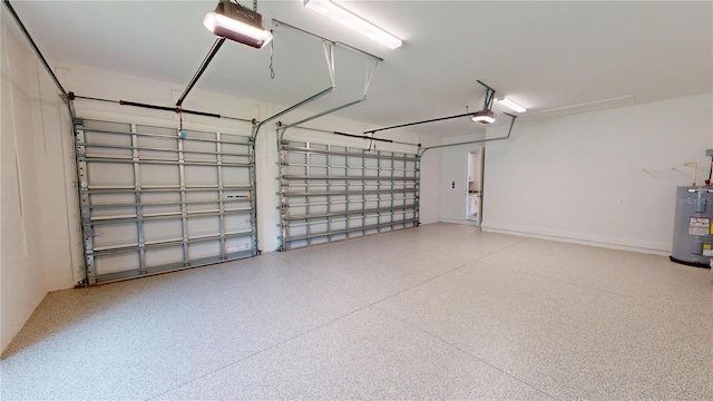 garage with water heater and a garage door opener