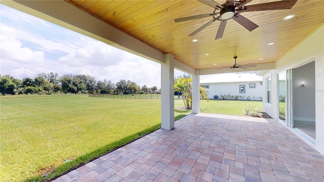 view of patio featuring ceiling fan