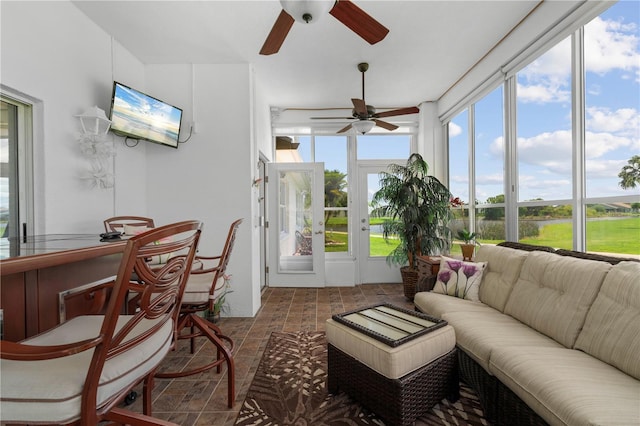 sunroom / solarium with ceiling fan