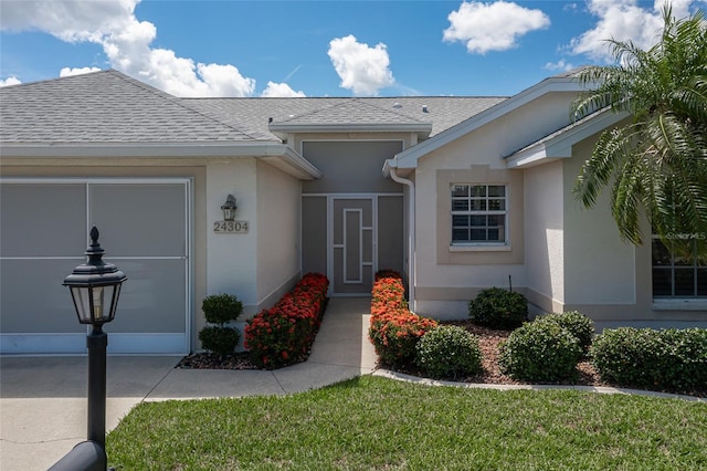 entrance to property with a garage