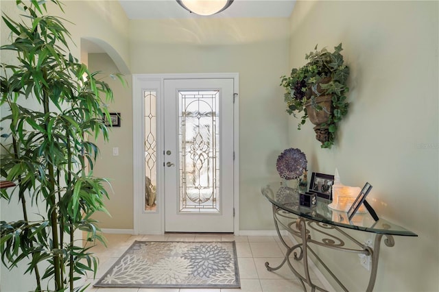 foyer featuring light tile patterned floors