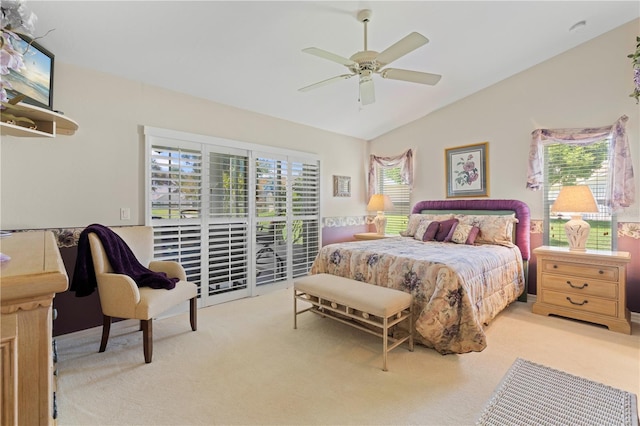 bedroom with ceiling fan, light colored carpet, lofted ceiling, and access to outside