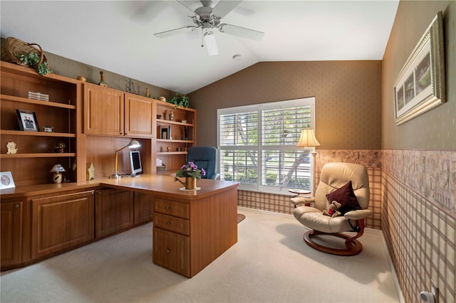 office area with built in desk, light colored carpet, ceiling fan, and lofted ceiling