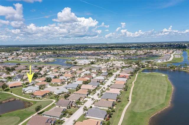 drone / aerial view featuring a water view