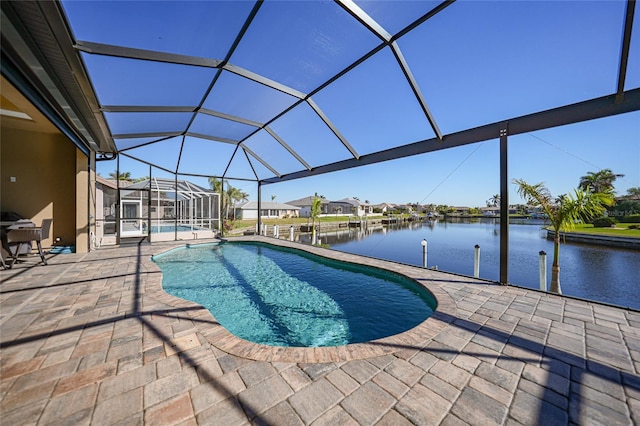 view of swimming pool with a lanai, a water view, a patio, and a boat dock