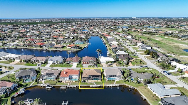 bird's eye view with a water view