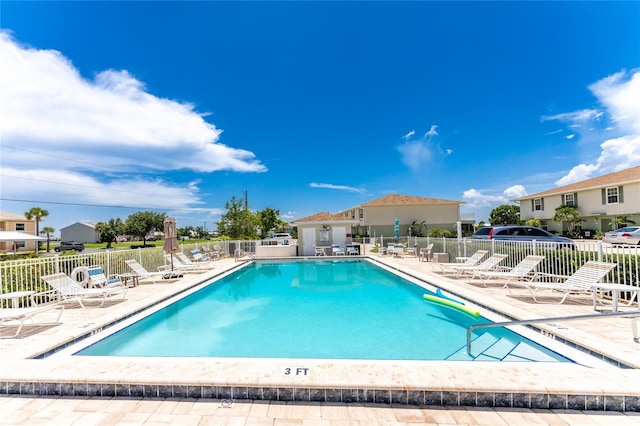 view of swimming pool featuring a patio