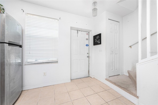 view of tiled entrance foyer