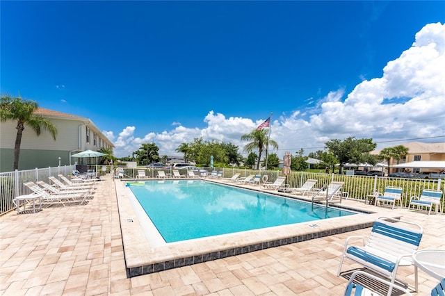 view of swimming pool featuring a patio