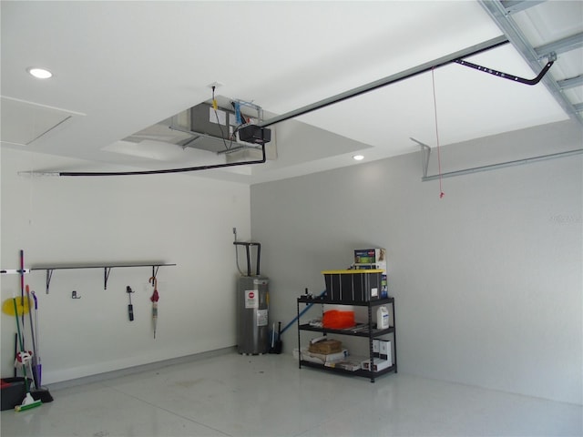 garage with electric water heater and a garage door opener