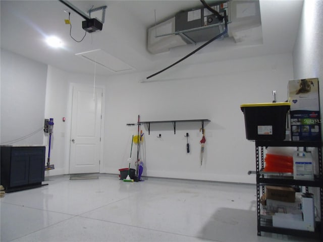 garage featuring a garage door opener