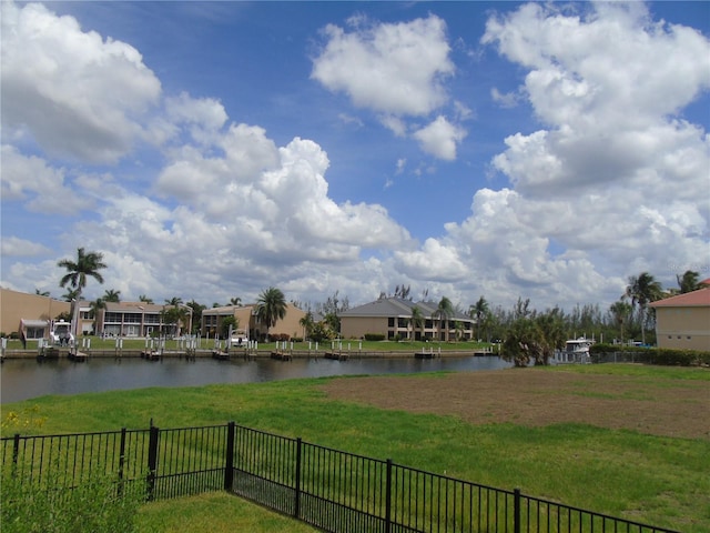 water view with fence and a residential view