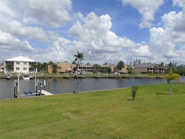 water view featuring a residential view and a boat dock