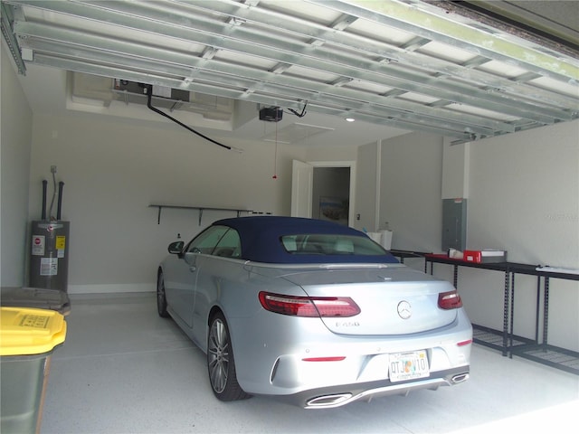 garage with electric panel, a garage door opener, and water heater