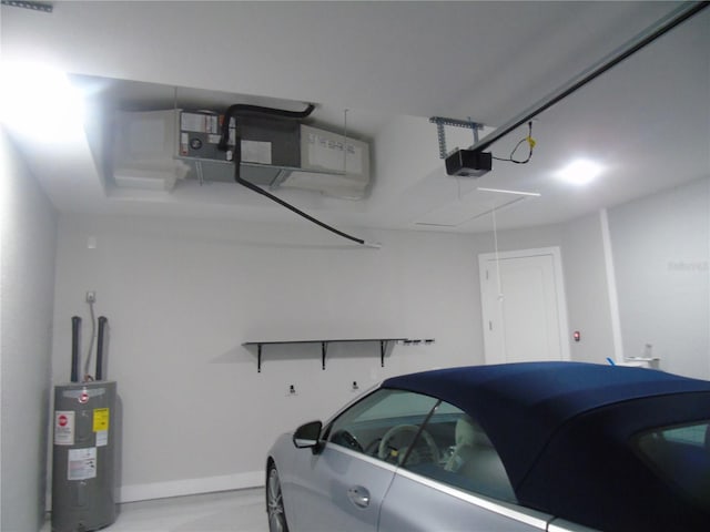 garage featuring electric water heater and a garage door opener