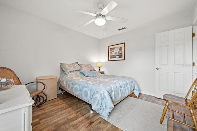 bedroom featuring wood-type flooring and ceiling fan