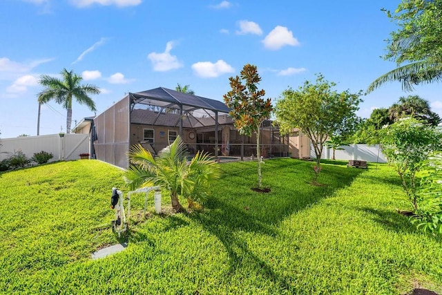 view of yard with a lanai